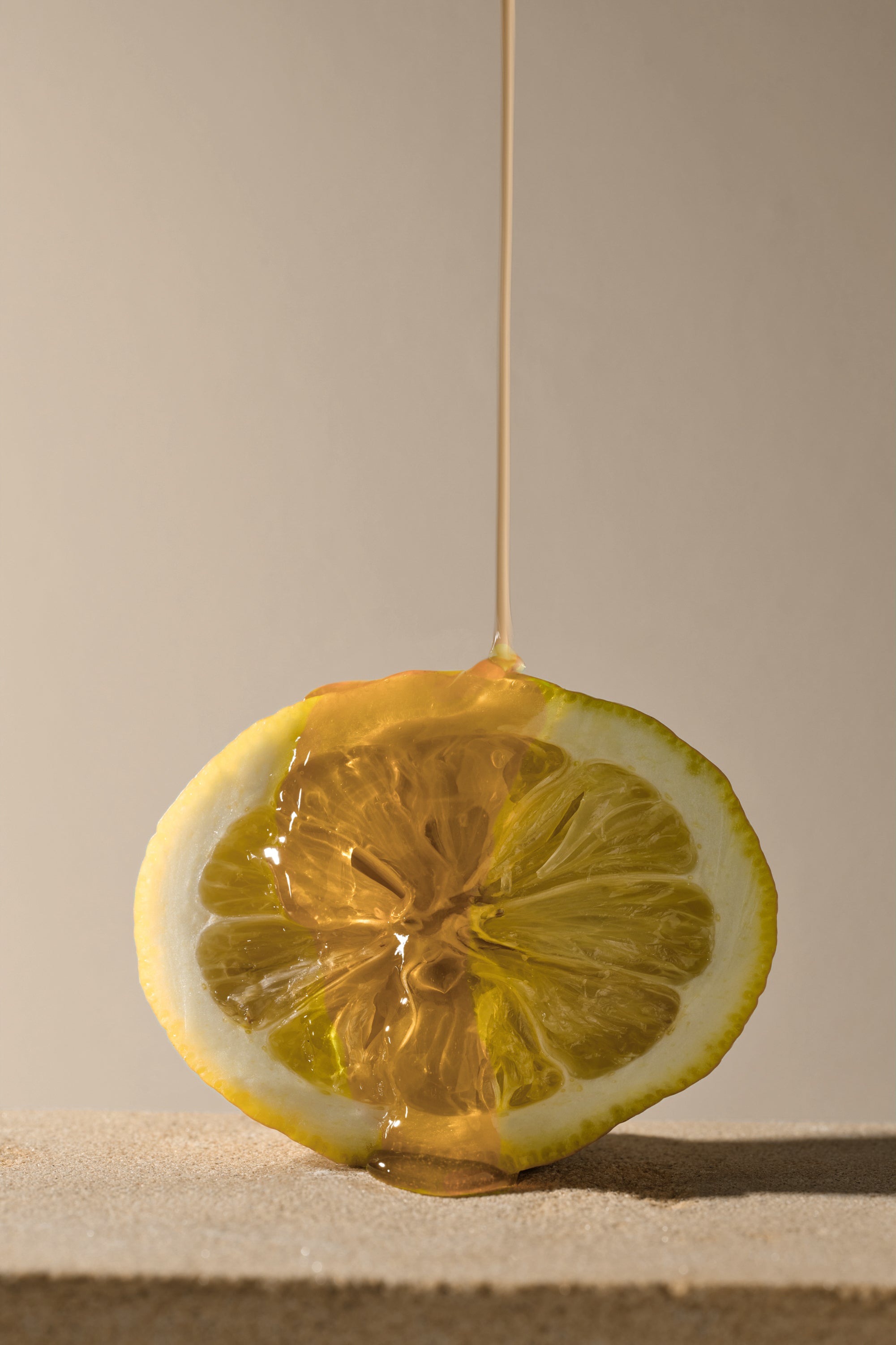 Lemon with honey drip by Idyll